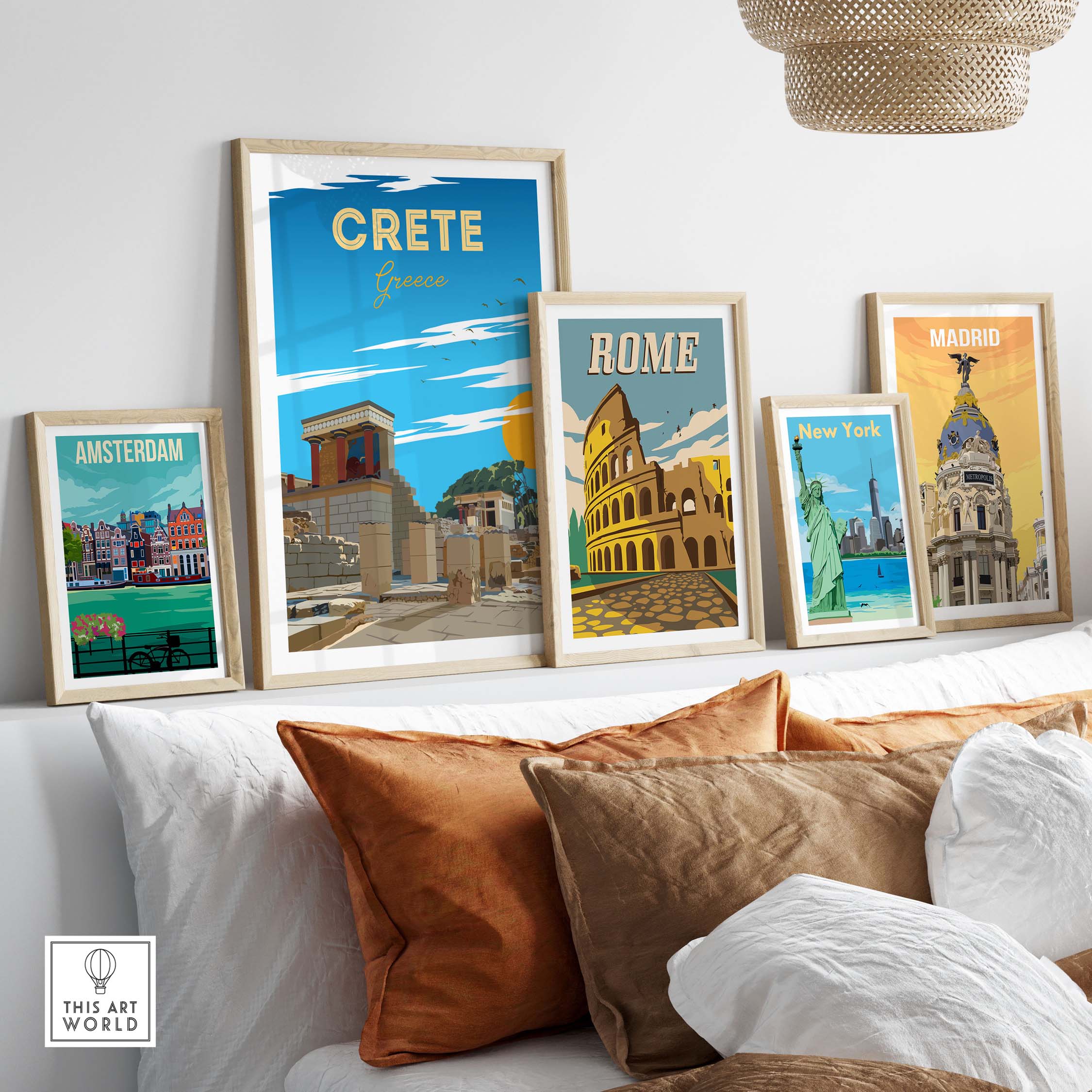 Framed travel poster prints including Crete, Rome, Amsterdam, Madrid, and New York on a stylish home decor setting.