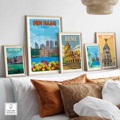 Framed Den Haag wall art print alongside other city prints like Amsterdam, Rome, and Madrid in a stylish home setting.