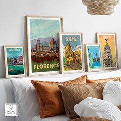 Framed vintage travel posters showcasing Florence, Rome, and other cities, enhancing home decor.