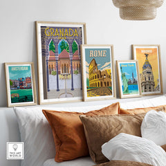 Framed travel posters of Granada, Rome, Madrid, Amsterdam, and New York showcasing vintage-inspired art.