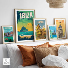 Ibiza Poster Wall Art Print with framed travel posters of Amsterdam, Rome, and Madrid, styled in a modern living space.