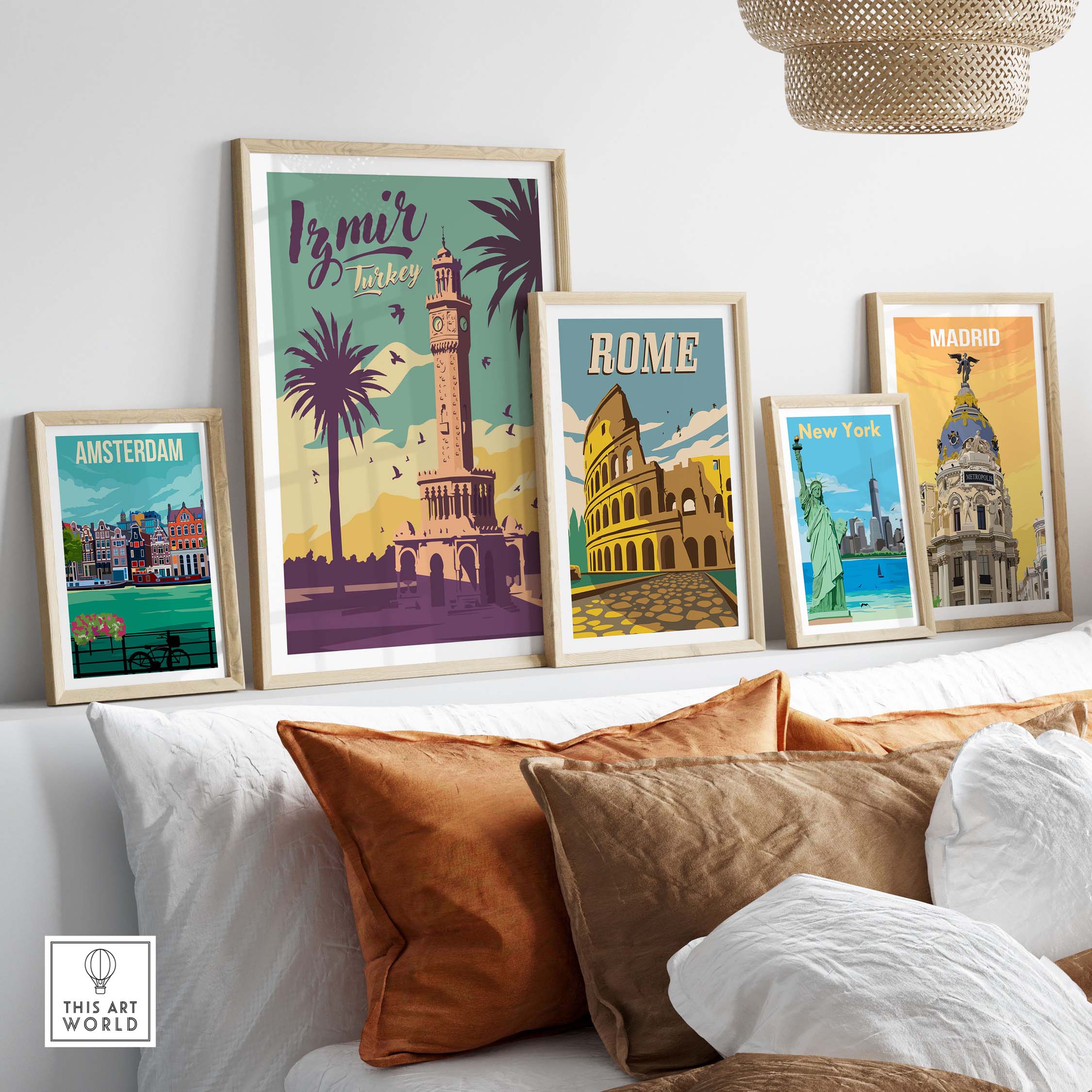 Stylish travel posters featuring Izmir, Rome, Madrid, New York, and Amsterdam on a cozy sofa backdrop.