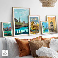 Leiden Netherlands Print displayed among framed vintage travel posters, showcasing stylish wall art for home decor.