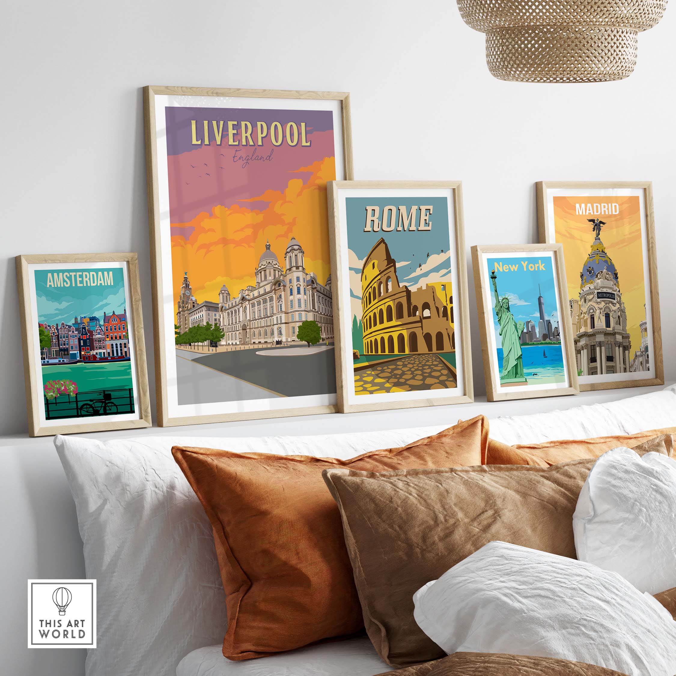 Stylish Liverpool poster and vintage travel art displayed in frames on a wall, enhancing home decor.