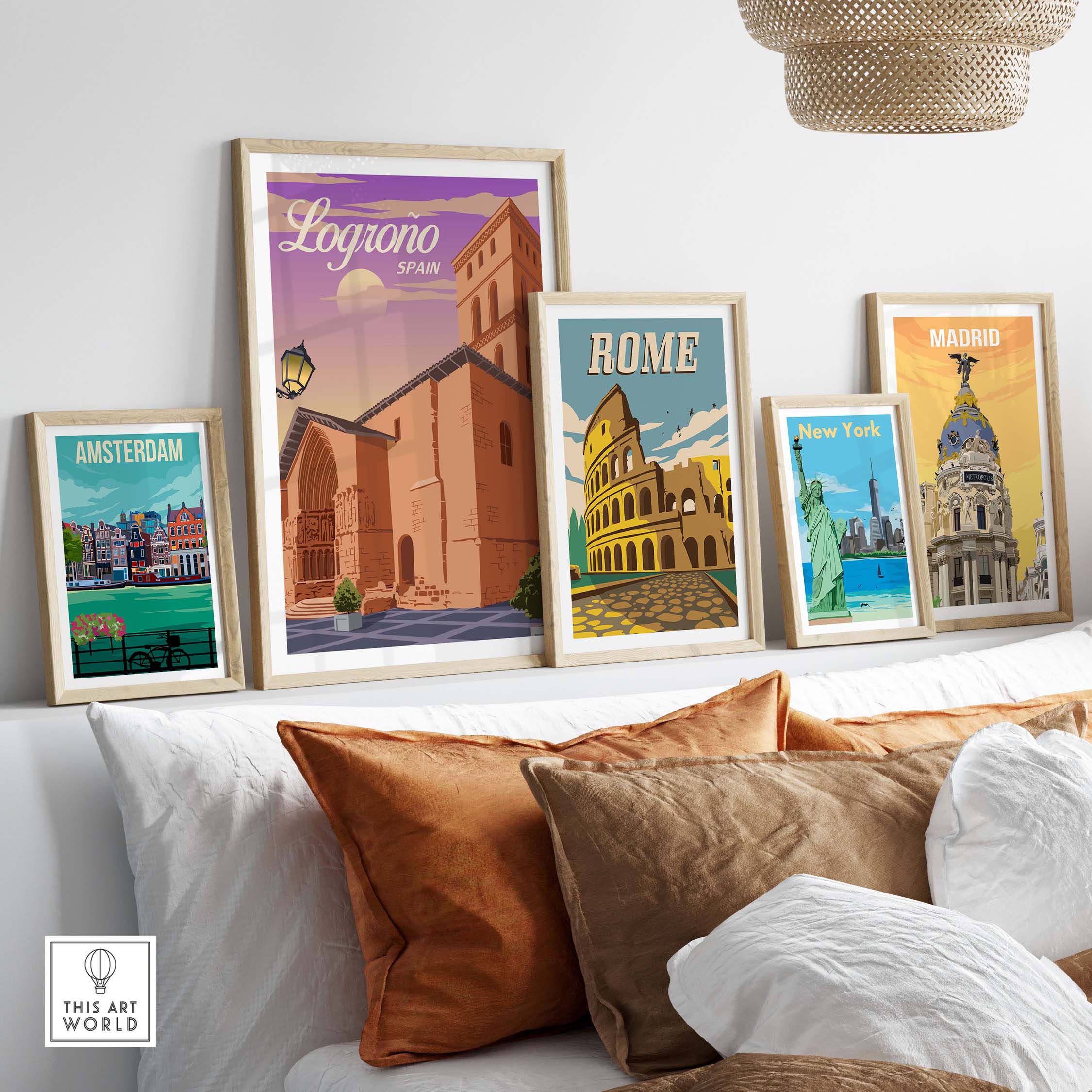 Framed vintage travel posters including Logrono Spain, Rome, and Madrid, showcasing stylish wall art for home decor.