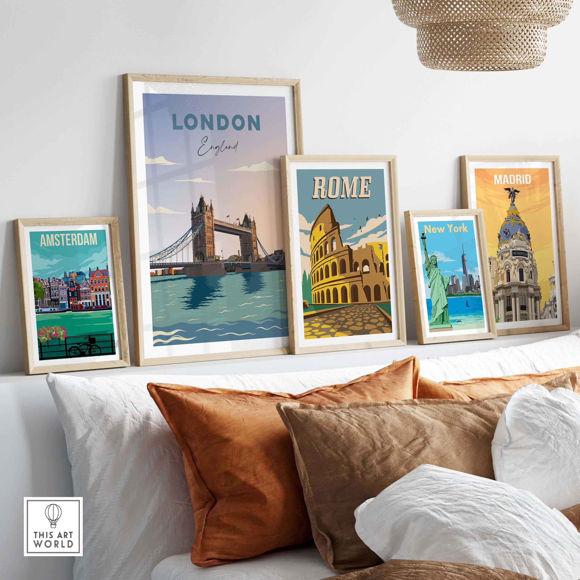 London travel poster print displayed with framed artwork of Amsterdam, Rome, New York, and Madrid on a stylish wall.