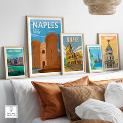 Stylish travel art prints featuring Naples, Rome, Amsterdam, New York, and Madrid in a cozy home setting.