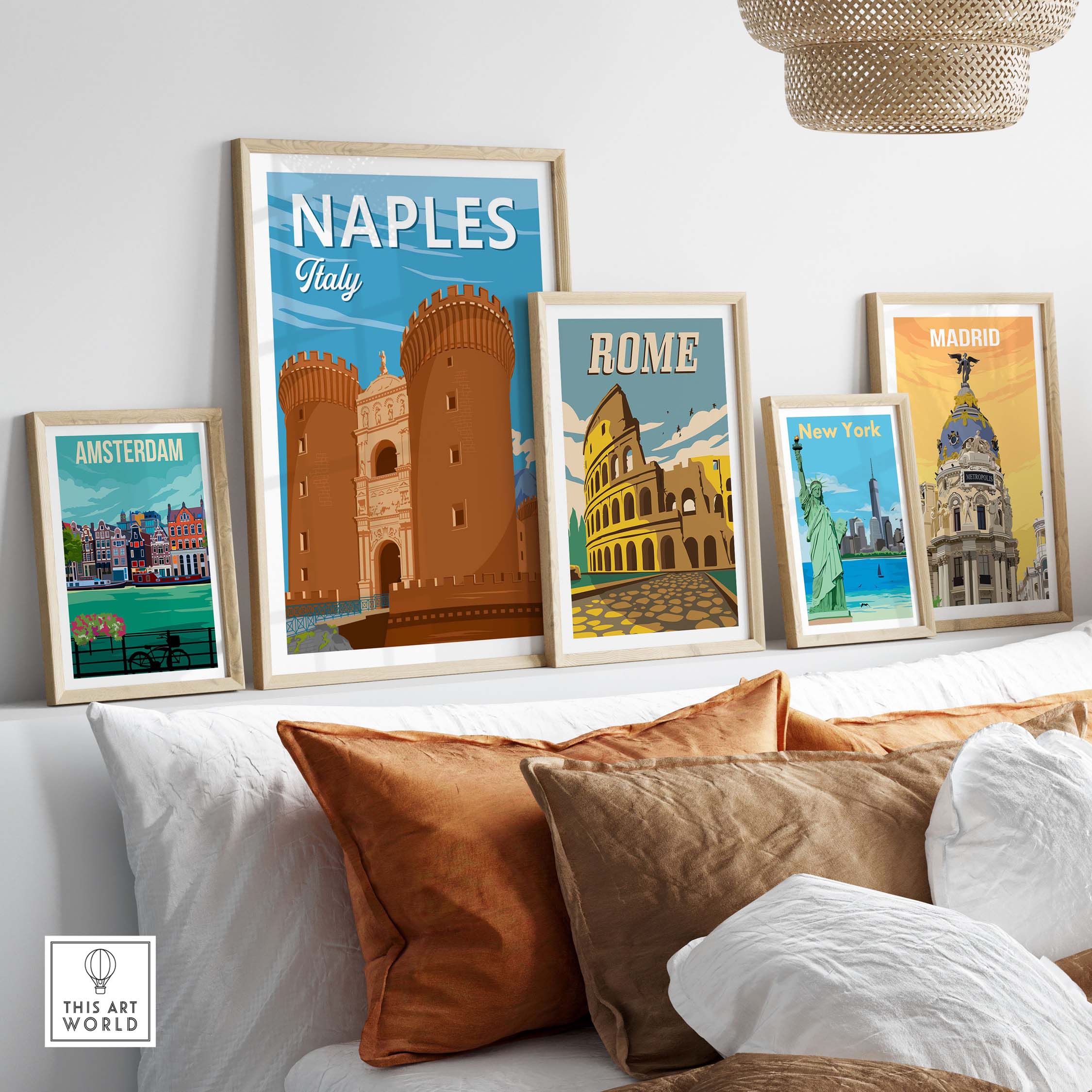 Stylish travel art prints featuring Naples, Rome, Amsterdam, New York, and Madrid in a cozy home setting.