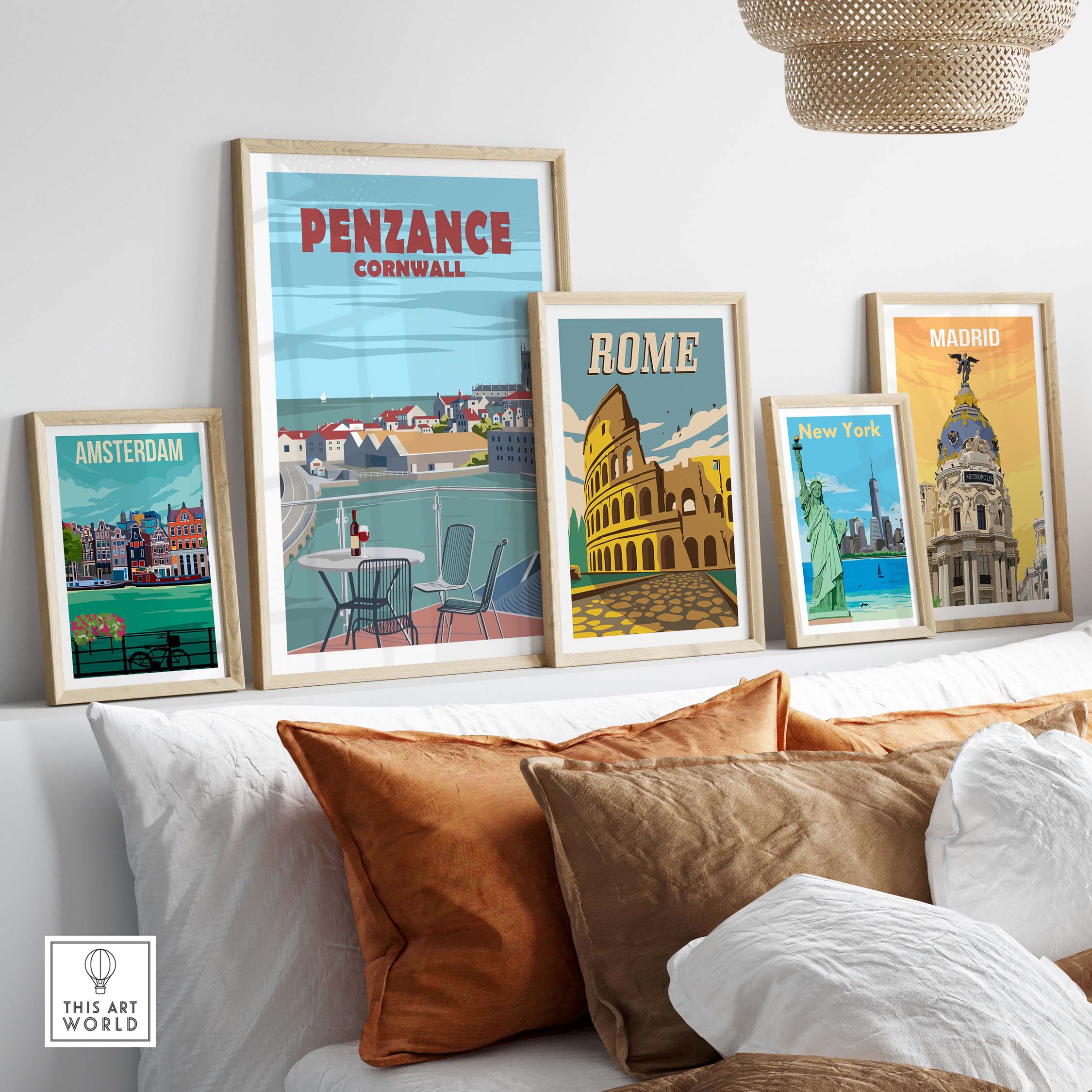Penzance Cornwall poster print displayed with vintage travel art in a stylish living room setting.