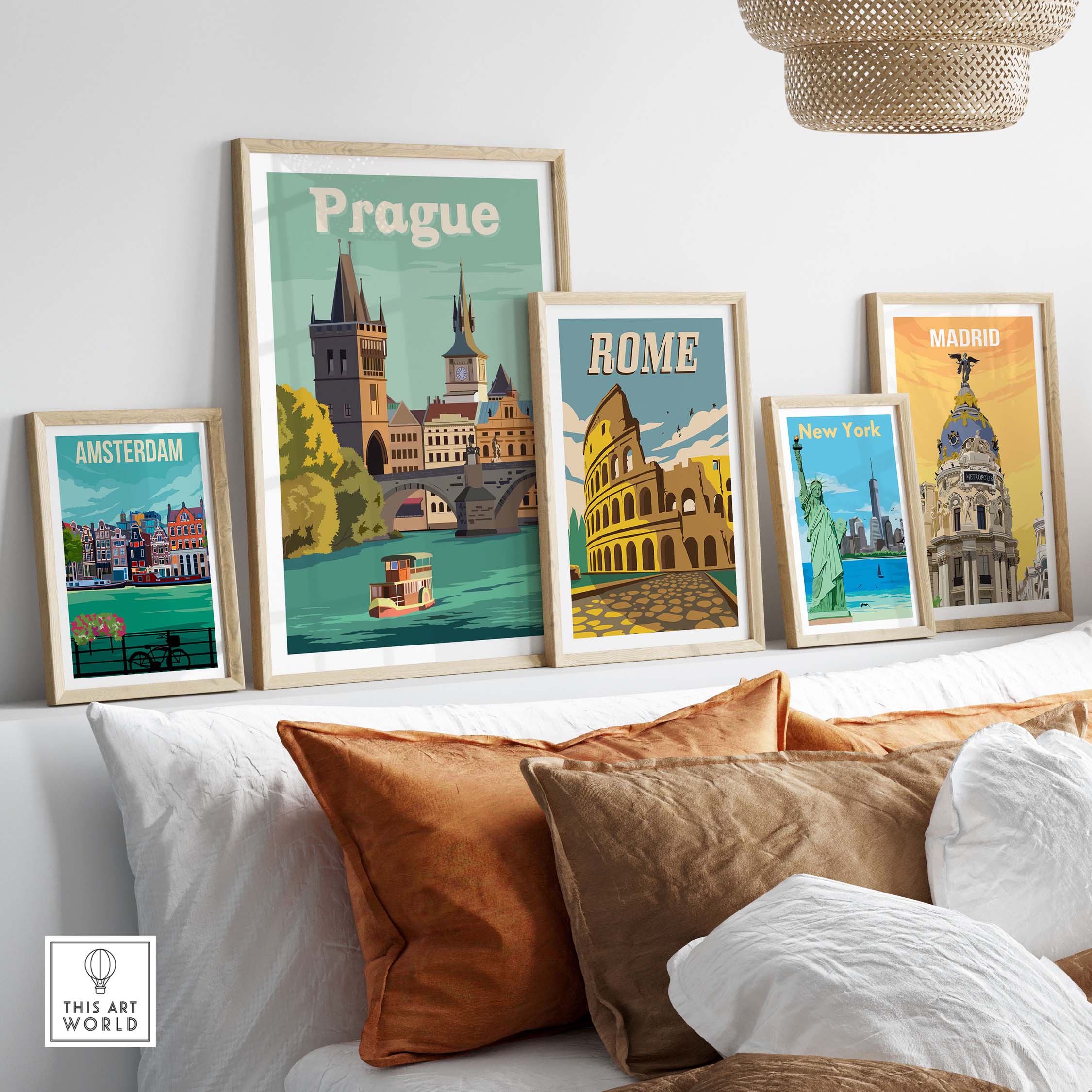 Vintage travel posters featuring Prague, Rome, Amsterdam, and New York displayed on a cozy home wall.