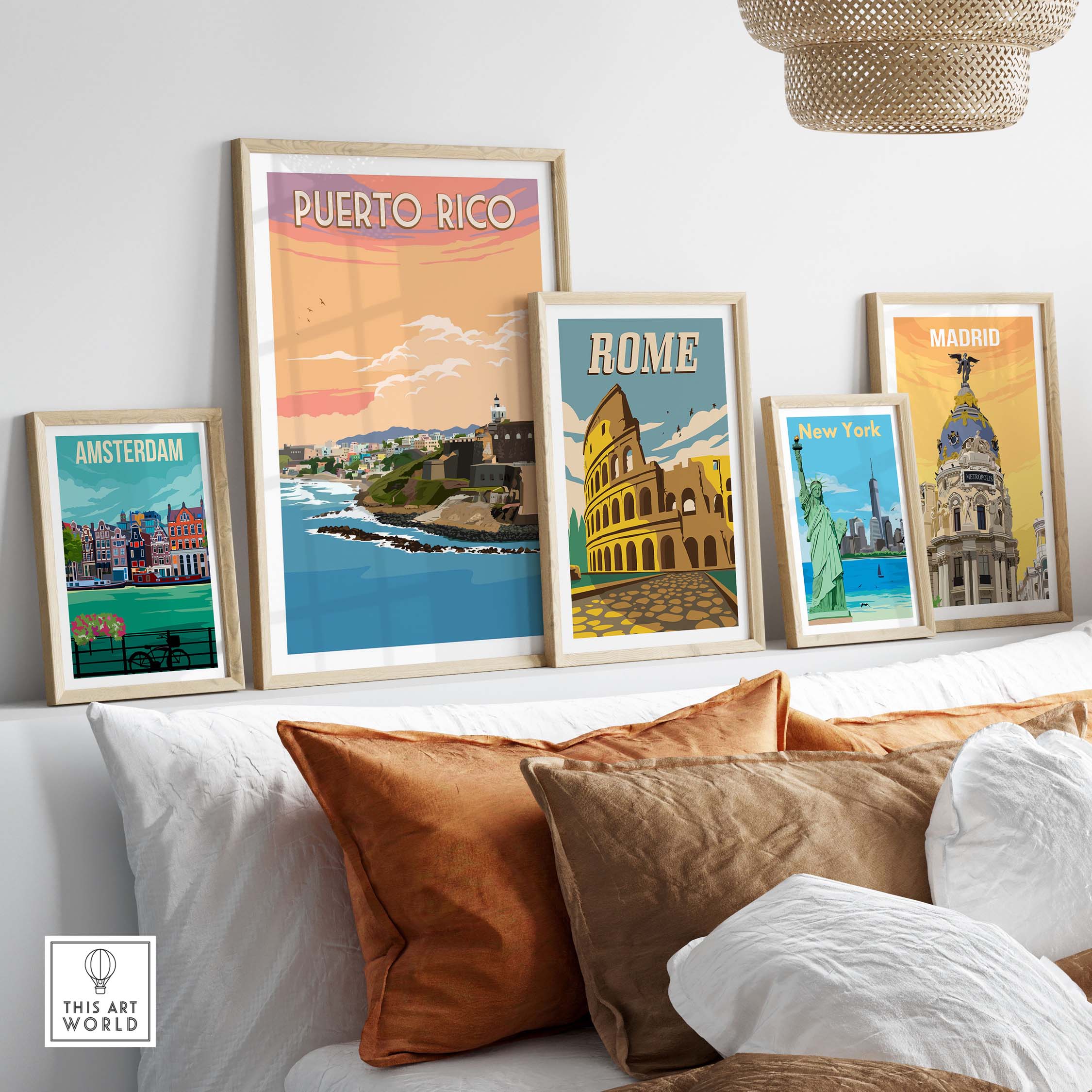 Decorative wall art featuring vintage travel posters of Puerto Rico, Amsterdam, Rome, and Madrid.