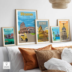 Framed Rome print posters and other city art on a modern living room wall showcasing vintage travel aesthetics.