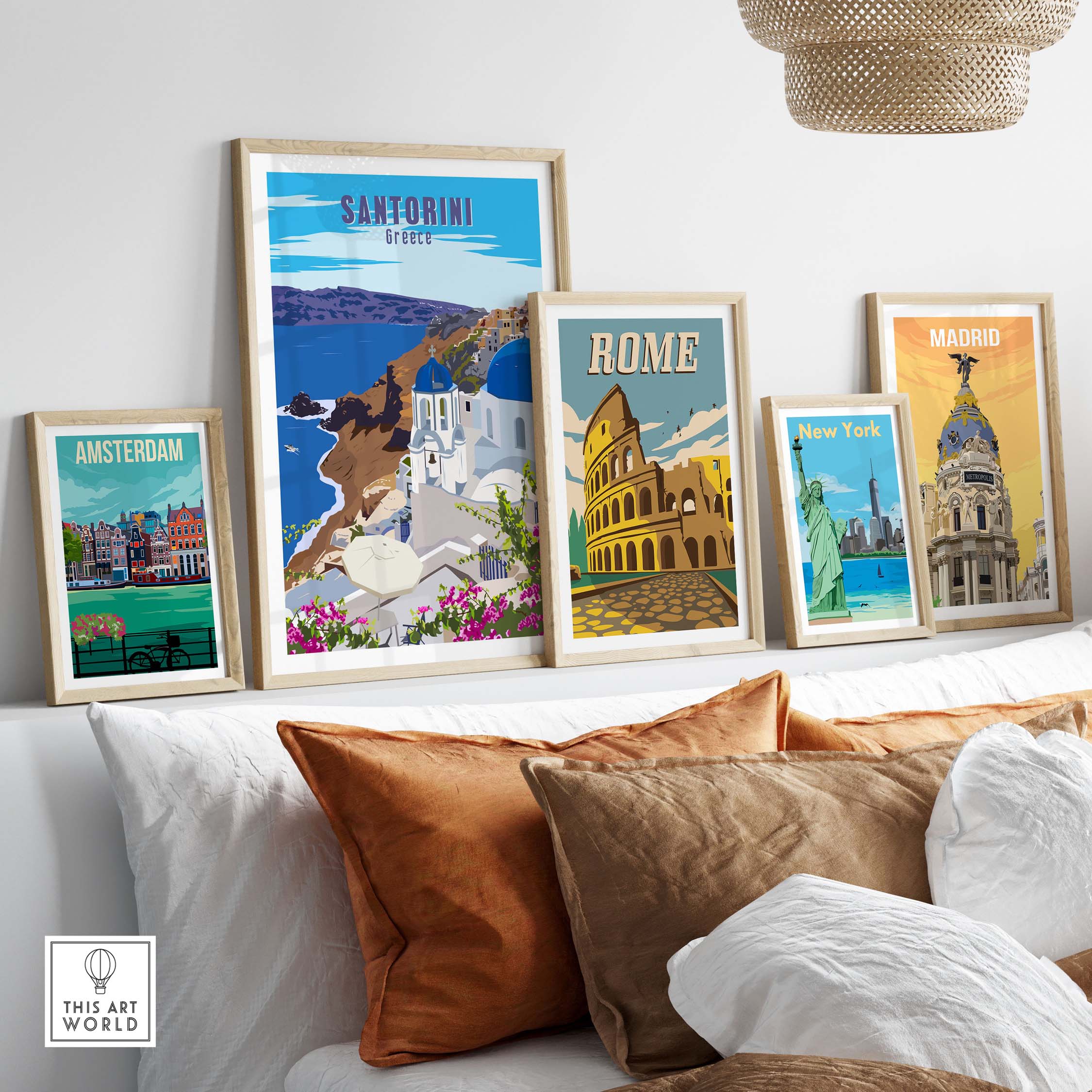 Vintage Santorini poster print showcased with travel art from Amsterdam, Rome, and New York in a stylish home setting.