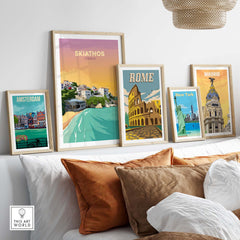 Skiathos travel poster print displayed with framed artworks of famous cities like Rome, Madrid, and Amsterdam.