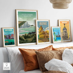 Stylish framed South Downs National Park poster among other city prints in a modern home interior.