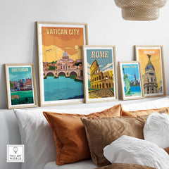 Vatican City Print and other vintage travel posters displayed stylishly in a cozy living room setting.