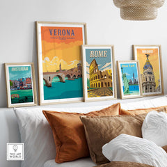 Verona Italy print and vintage travel posters displayed on a stylish sofa with decorative cushions.