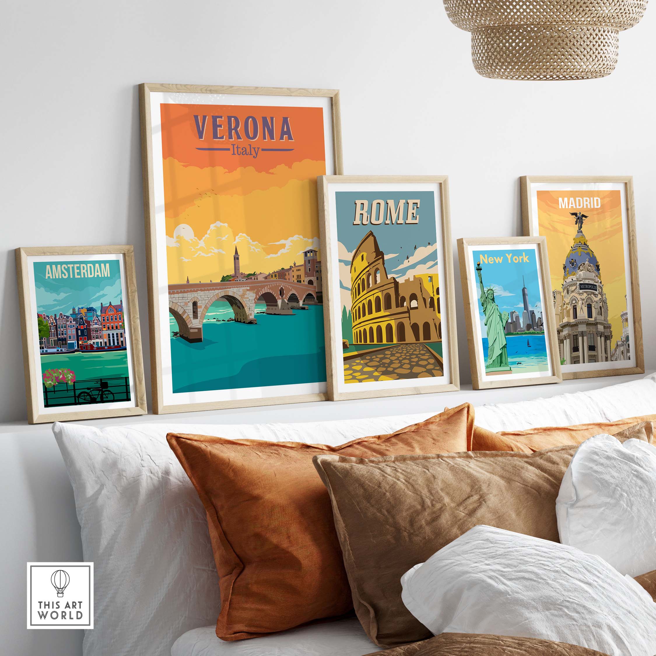 Verona Italy print and vintage travel posters displayed on a stylish sofa with decorative cushions.