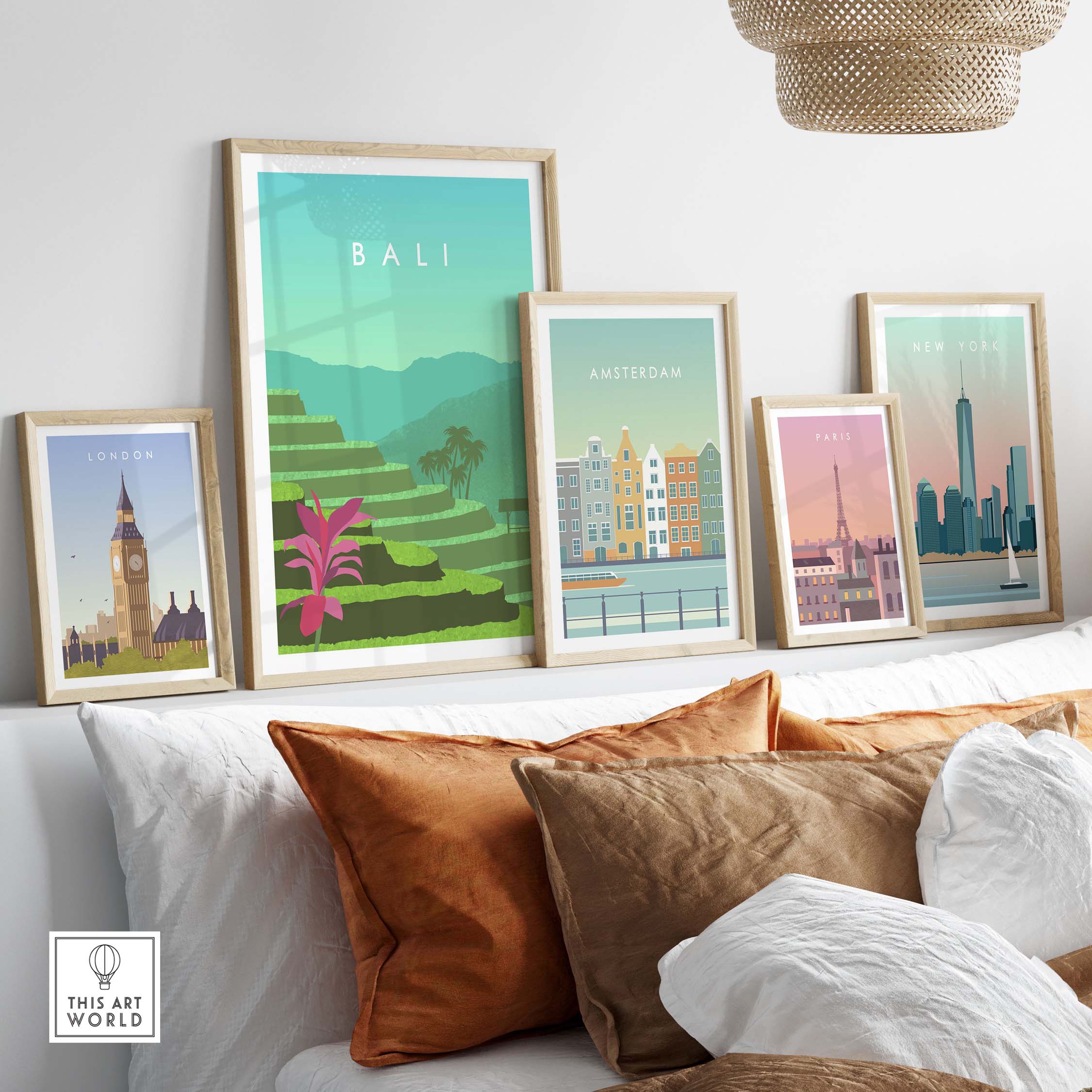 Elegant wall displaying Bali Print Wall Art Poster among other travel-themed artworks in stylish frames.