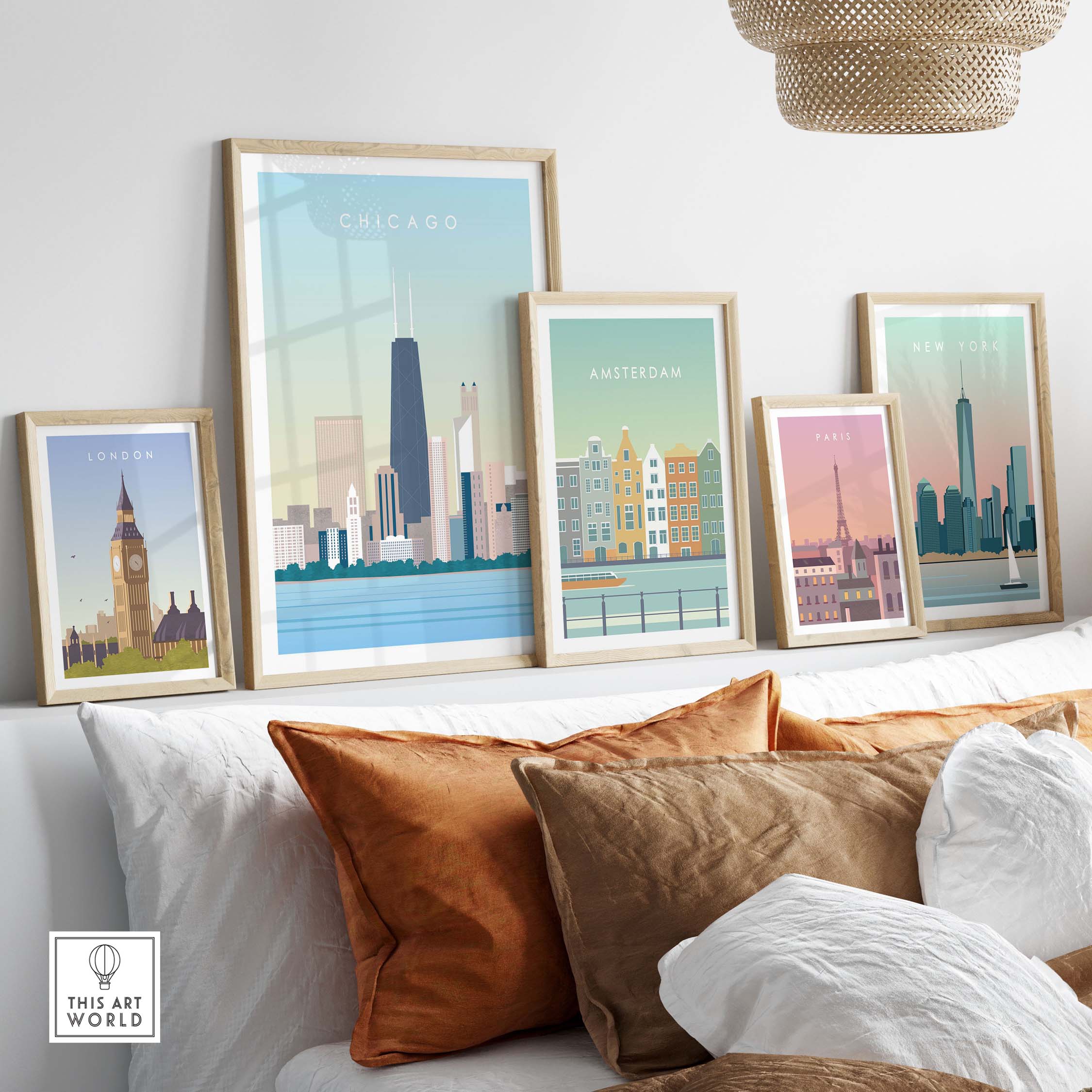 Framed city skyline posters including New York, Chicago, London, and Amsterdam displayed over a stylish couch.
