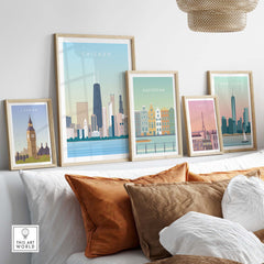 Chicago Print Wall Art Poster displayed among framed city skyline art pieces on a stylish sofa background.