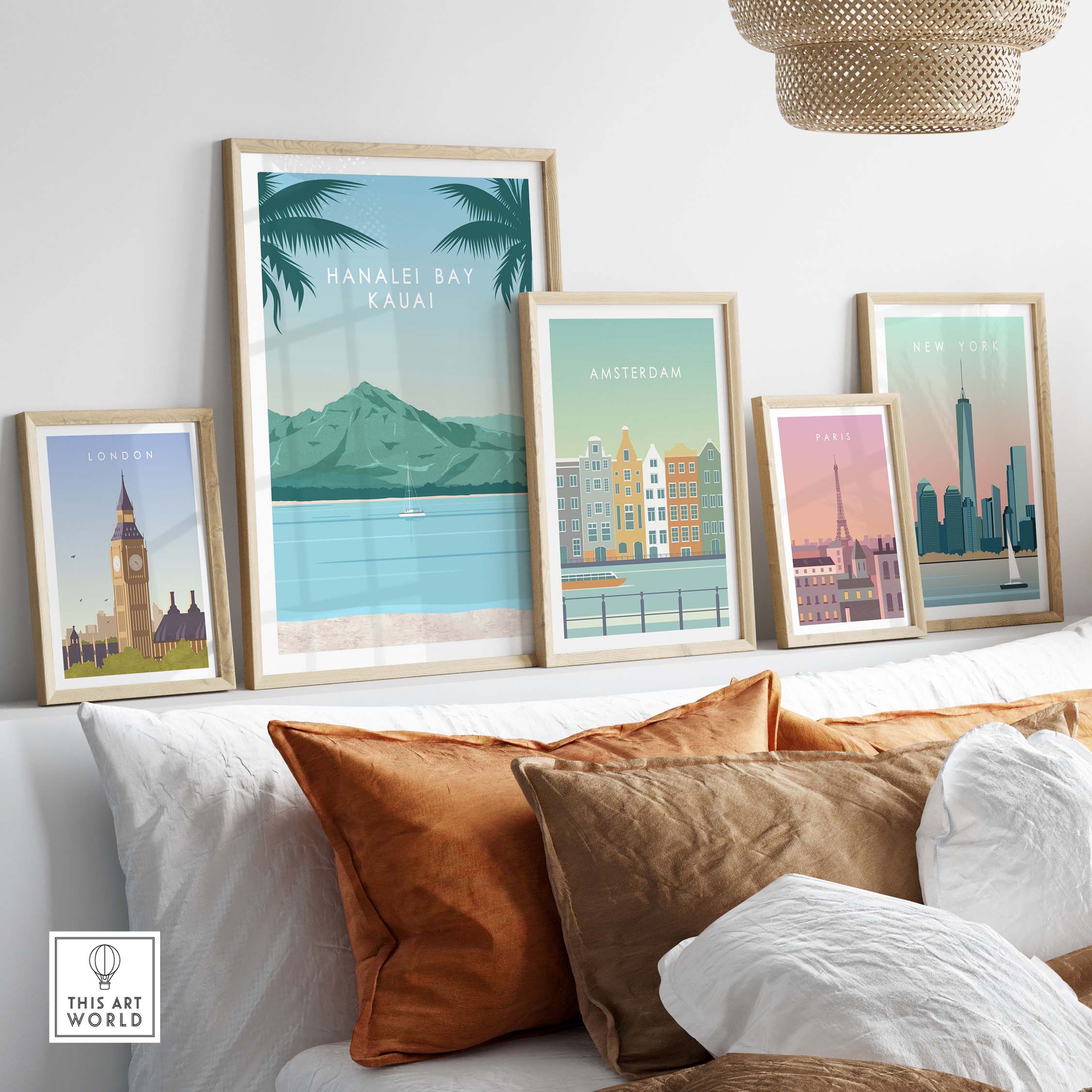 Kauai print wall art poster featuring Hanalei Bay along with framed vintage travel posters in a stylish home setting.