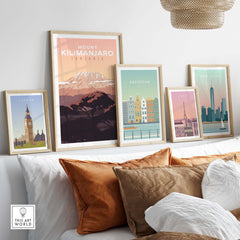 Kilimanjaro Print Wall Art Poster displayed with vintage city travel posters in a stylish home setting.