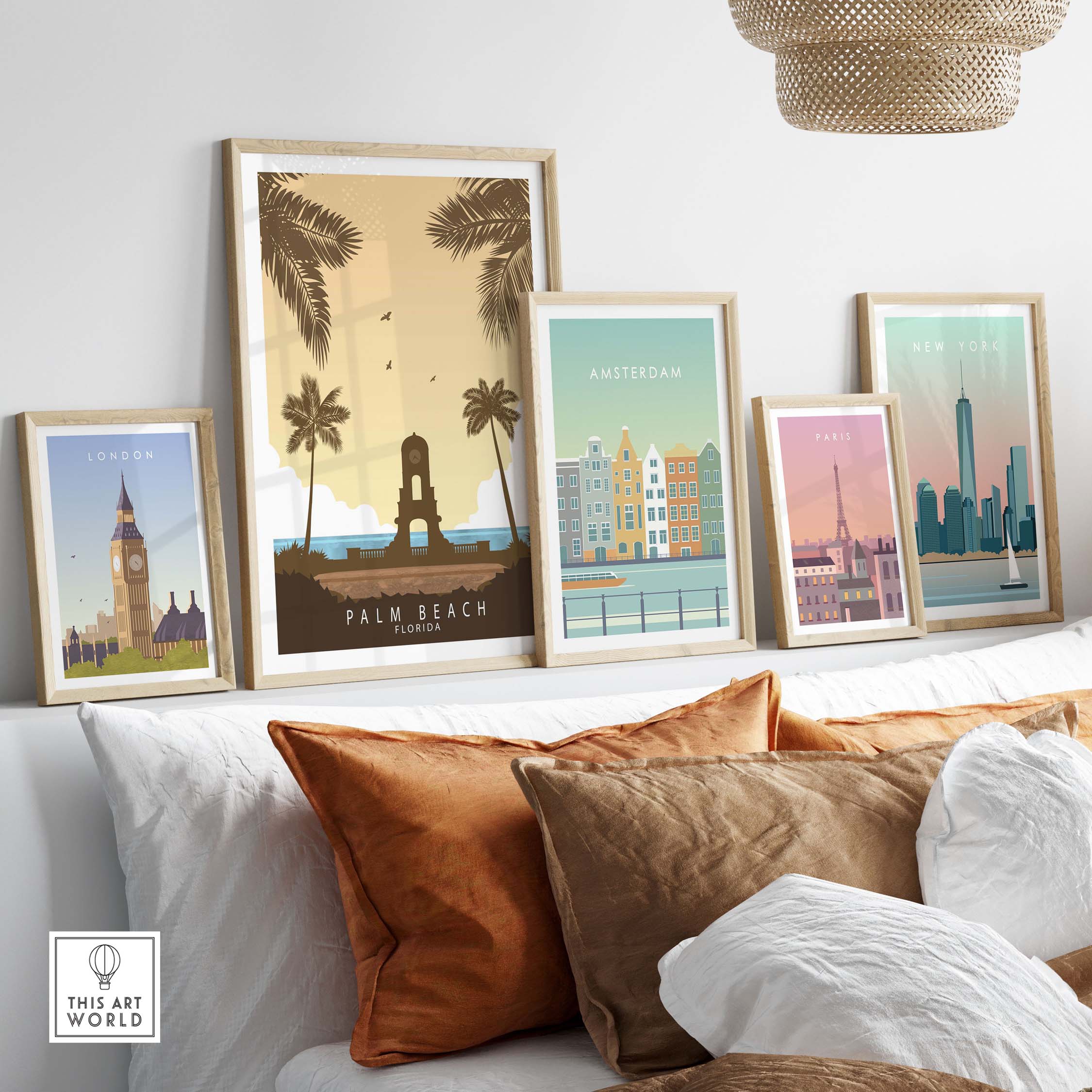 Palm Beach Florida Print among framed vintage travel posters in a stylish living room decor.