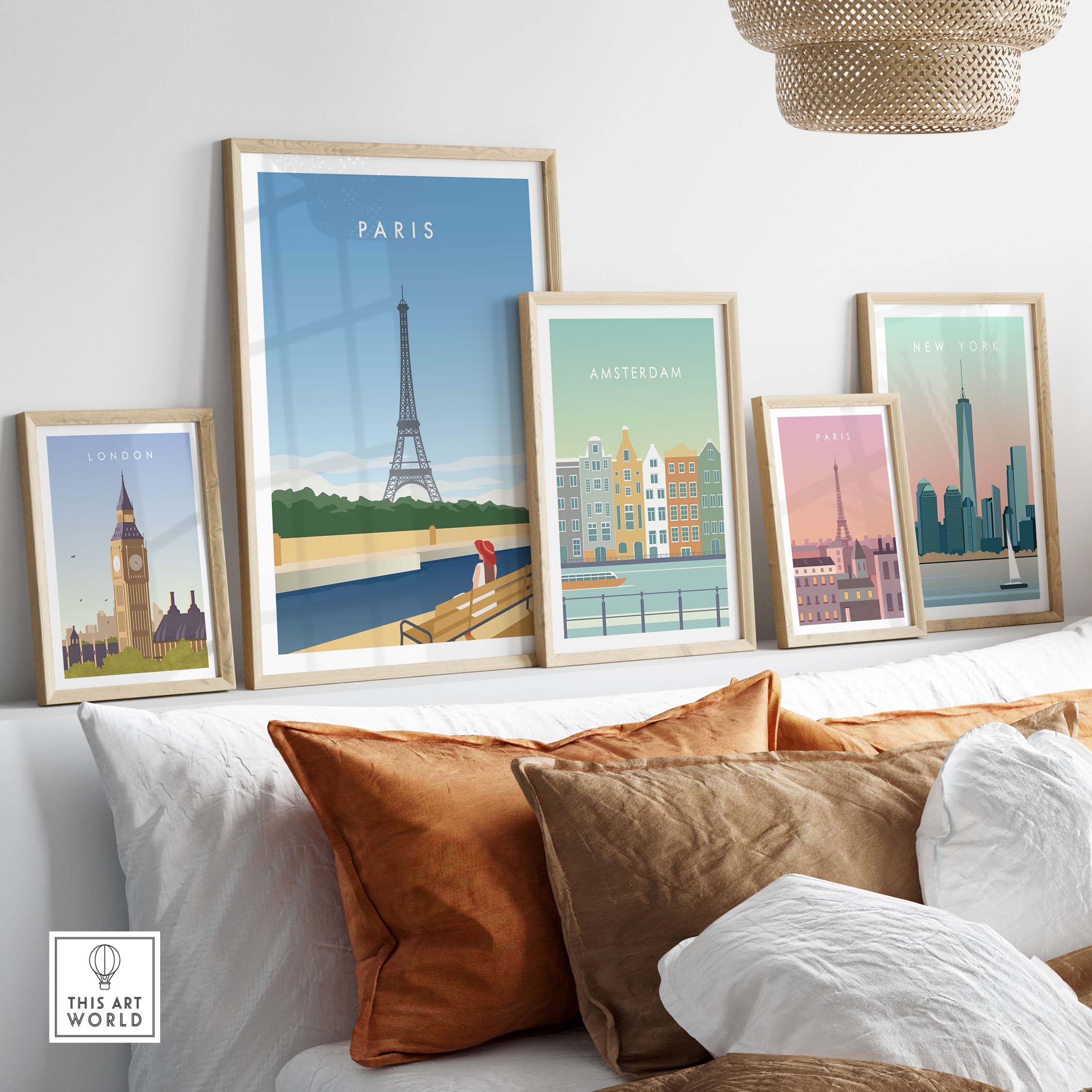 Paris wall art poster displayed with framed city prints on a cozy sofa setup, adding a stylish touch to home decor.