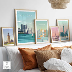 Rotterdam Print Wall Art Poster displayed among other city posters on a stylish sofa with cushions.