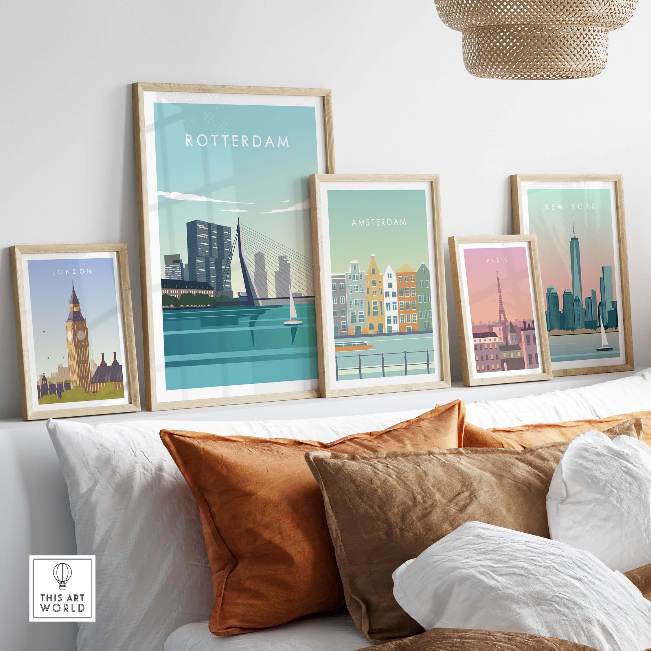 Rotterdam Print Wall Art Poster displayed among other city posters on a stylish sofa with cushions.