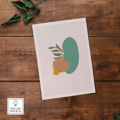 Mid Century Wall Art print featuring abstract shapes and organic elements on a wooden background.