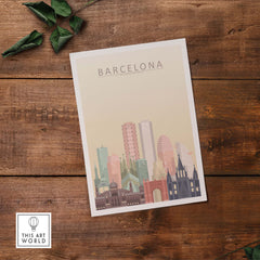 Barcelona skyline print wall art featuring iconic buildings in warm pastel tones on a wooden background.