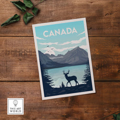 Canada wall art print featuring a stag silhouette against mountains and lake, capturing vintage travel nostalgia.
