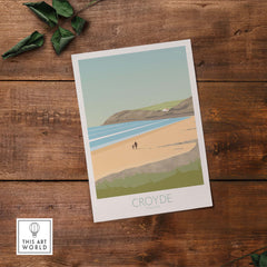 Croyde Beach vintage travel print poster featuring serene beach scene and coastal colors.