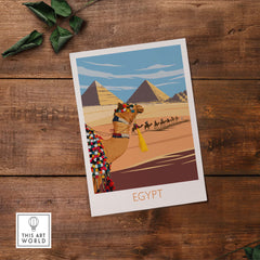 Egypt wall art print featuring a camel, pyramids, and a desert scene in a vintage travel poster style.