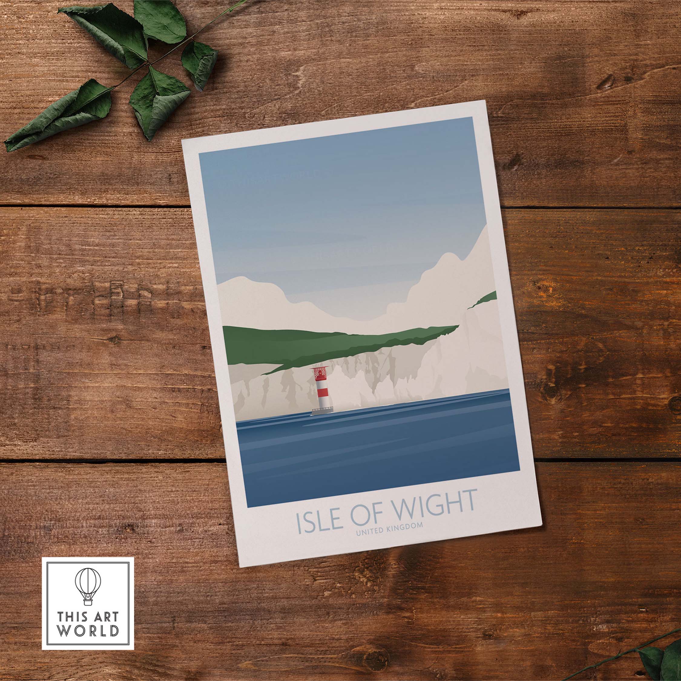 Isle of Wight Print showcasing vintage-inspired travel art framed on a wooden surface, perfect for home or office decor.