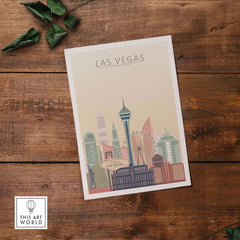 Las Vegas Skyline Poster featuring iconic landmarks in warm pastel tones on a wooden surface.