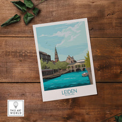Leiden Poster Netherlands with vintage travel art, featuring a picturesque canal and historic architecture.