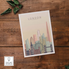 London skyline print featuring iconic landmarks in warm pastel tones on a wooden backdrop.