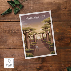 Madagascar print featuring Avenue of the Baobabs, vintage-style travel poster on wooden table.