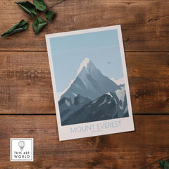 Mount Everest Print Travel Poster featuring a serene mountain landscape in vintage style on wooden background.