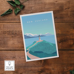 New Zealand Print Wall Art Poster showcasing a scenic coastal view with lighthouse and mountains.
