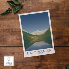 Rocky Mountain National Park art print featuring minimalist design and serene mountain reflection on water.