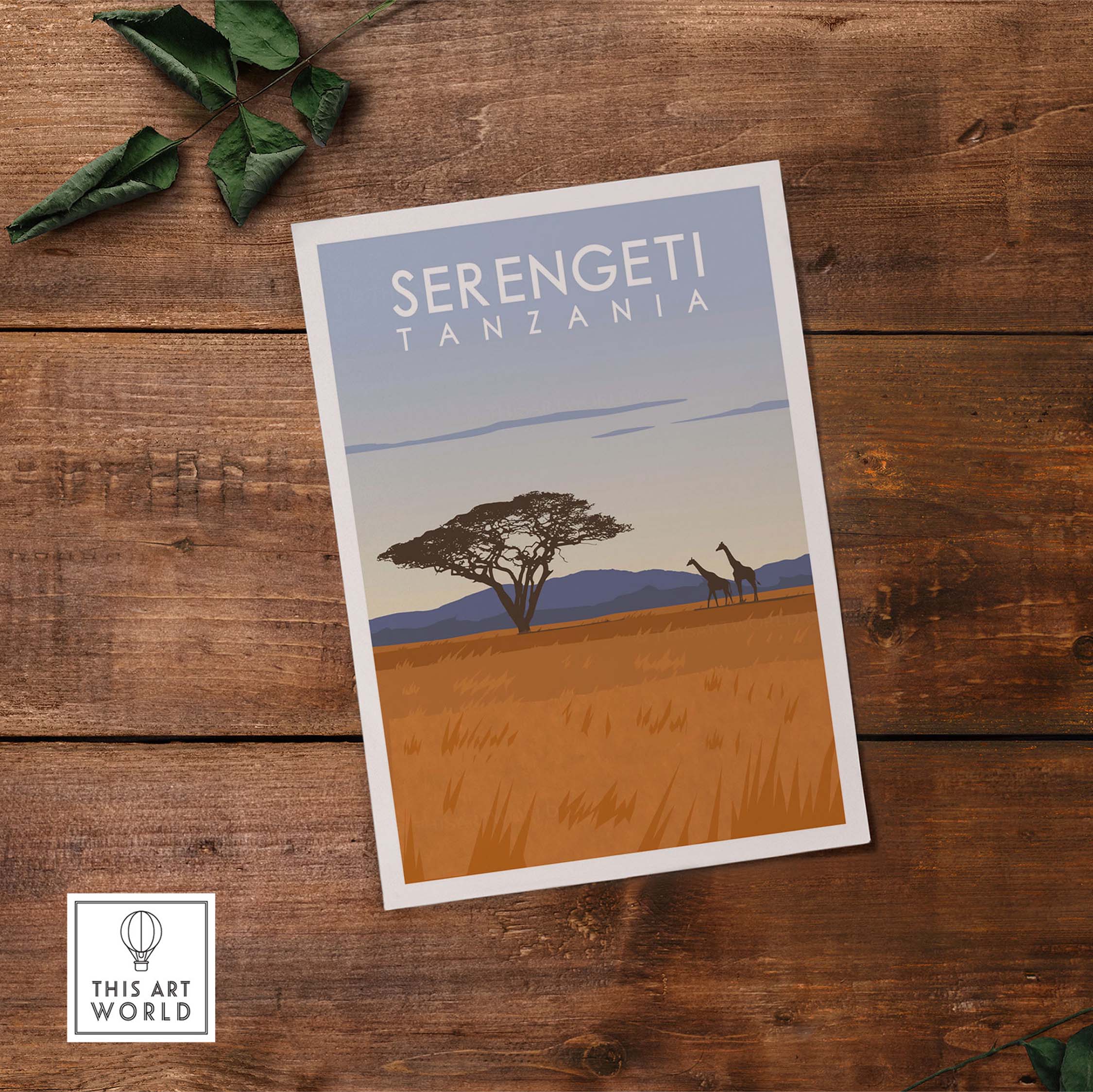 Serengeti Print Tanzania travel poster featuring a giraffe and acacia tree on a sunset background.