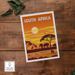 Vintage style South Africa poster featuring elephants and giraffes at sunset, perfect for home decor.