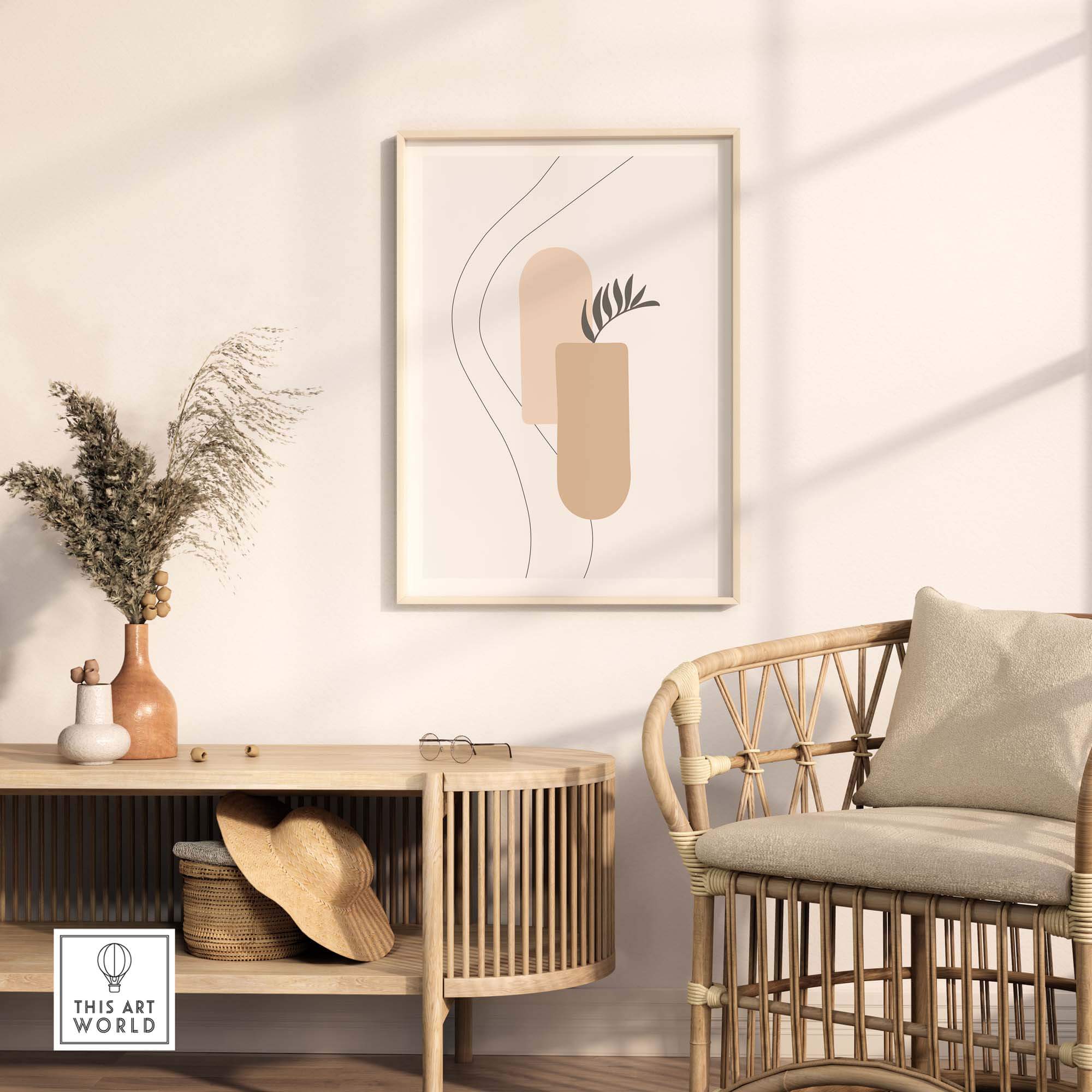 Abstract palm leaf print framed above a stylish wooden table in a modern living space.