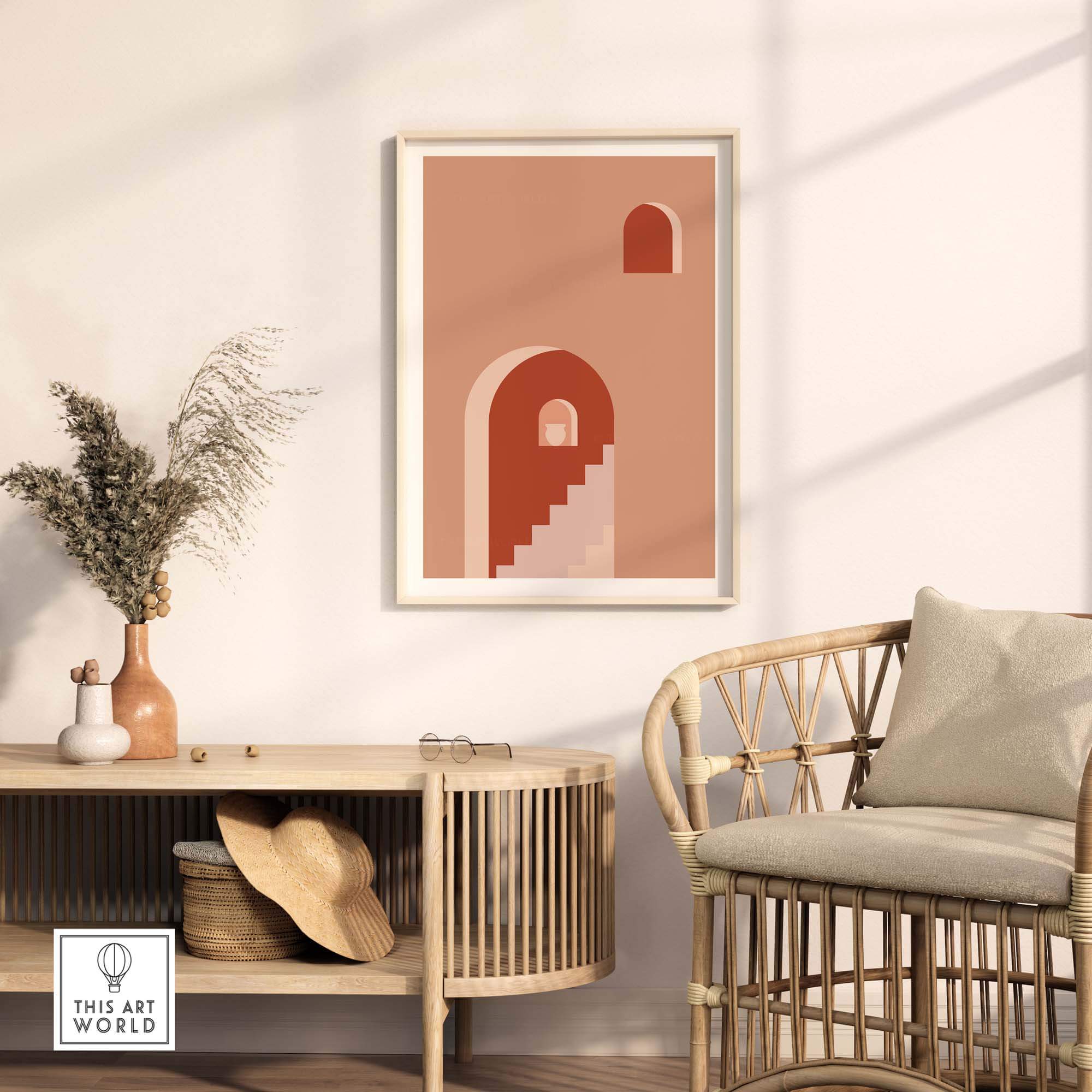 Mid century abstract print featuring a warm color scheme, displayed above a modern rattan chair and console table.