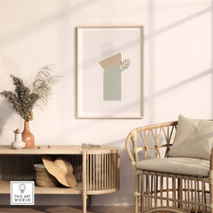 Abstract wall art featuring a modern green and neutral design, framed and displayed in a stylish living space.