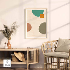 Modern abstract digital print with geometric shapes in a stylish living room setting.